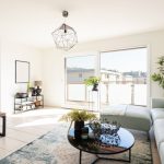 modern living room with designer sofa and coffee table.